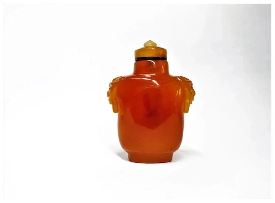 Cabeza de león tallada cornalina china vintage con anillo en la boca botella de tabaco y tapa Foto 2 de 4