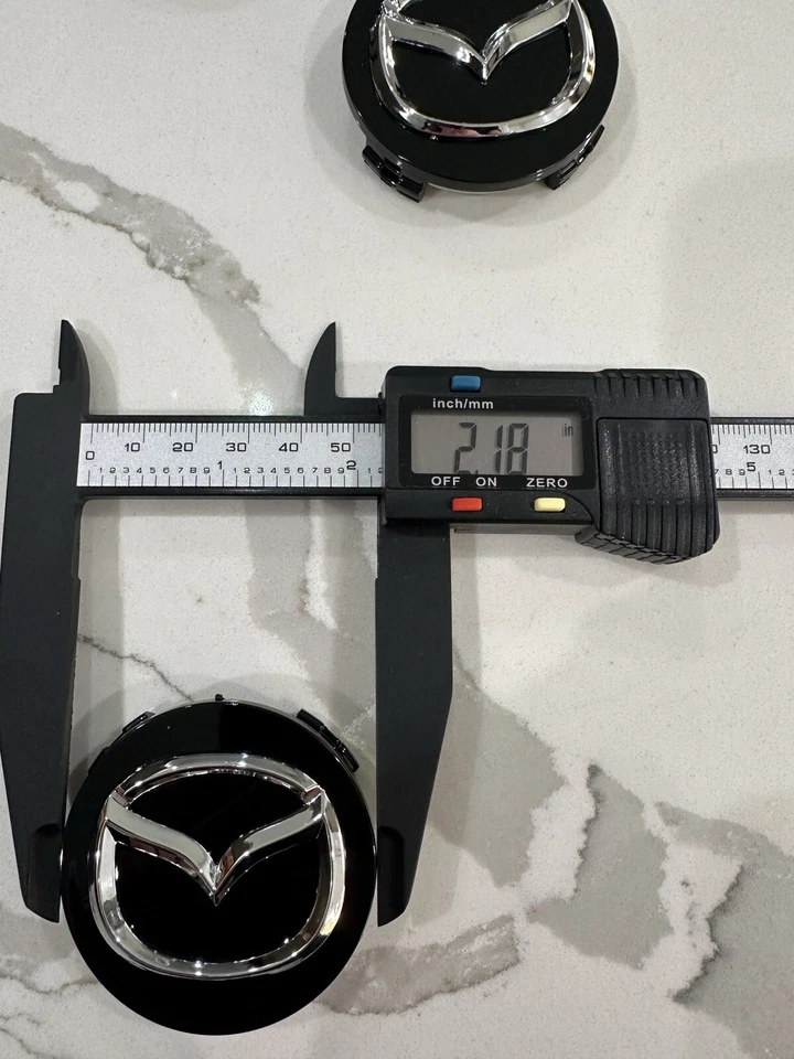 (4 X) Tapacubos centrales MAZDA 56mm negros Mazda 3/5/6, RX 8, Miata, CX-3/5/7/9 Foto 3 de 3