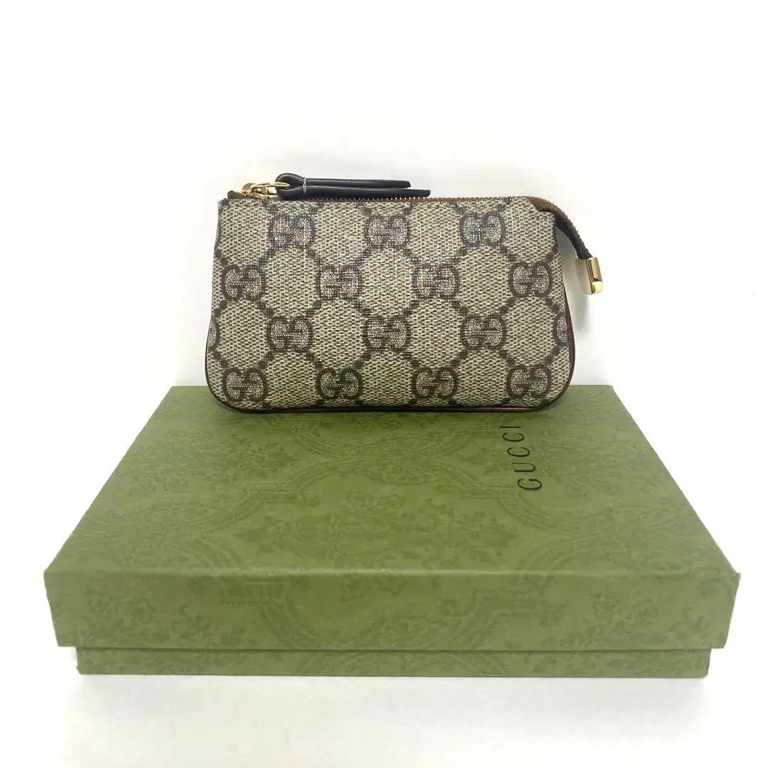 Gucci Beige/Gold GG Canvas GG Charm Pochette Bag - Yoogi's Closet