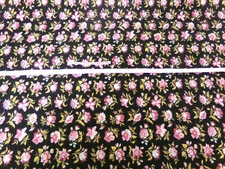 Peter Pan Fabric. Black with Pink Mauve  Flower print. Approx. 19x44. F25-282