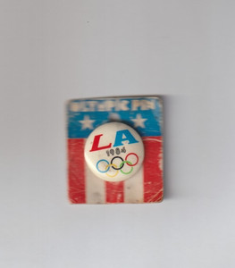 RARE OLYMPIC PIN LA 84 STILL ON PAPER BACKING LA OLYMPICS 1984 RARE CERAMIC PIN