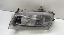 Feu avant (phare) Mazda 323