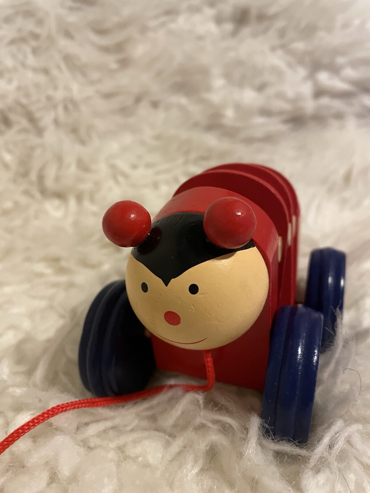 Happy Lady Bug Wooden Pull Toy