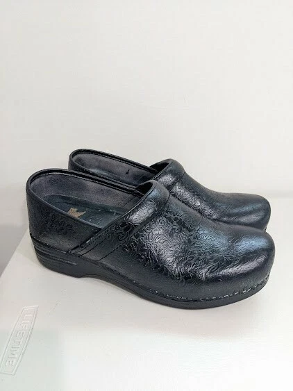 Dansko black floral clearance tooled