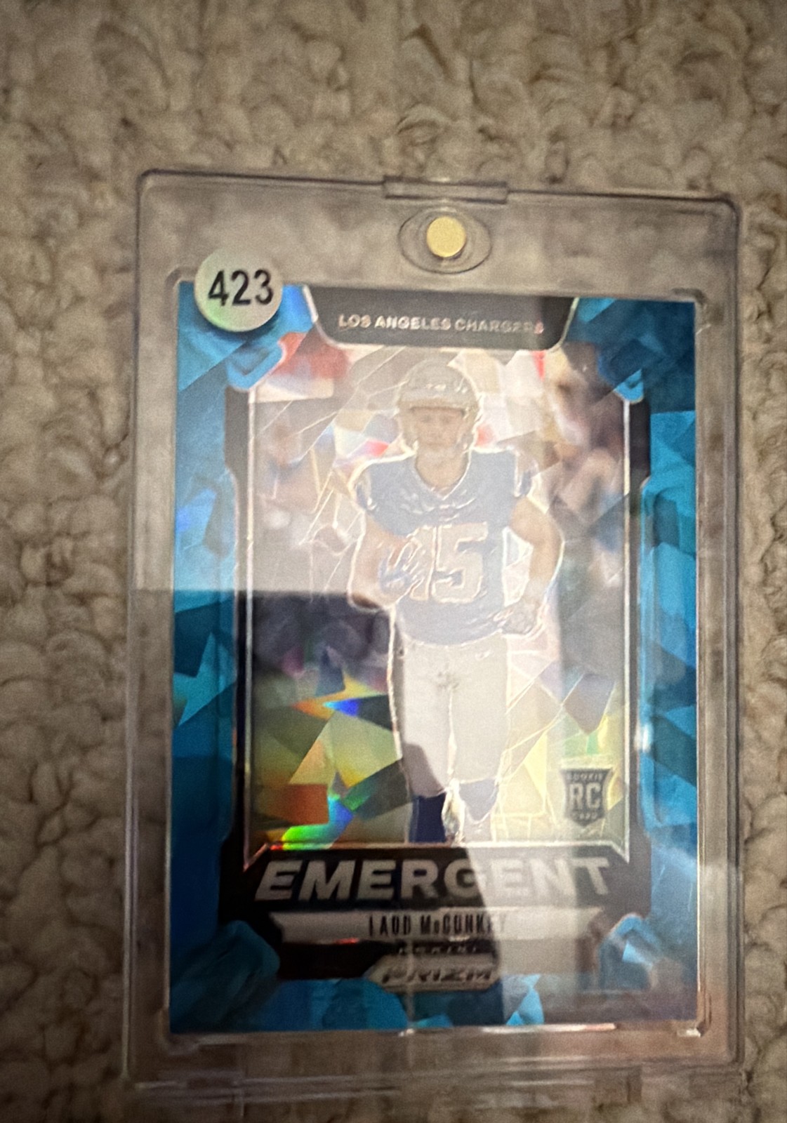 2024 Panini Prizm - Emergent Ladd McConkey #13 Blue Ice Prizm /99 (RC)