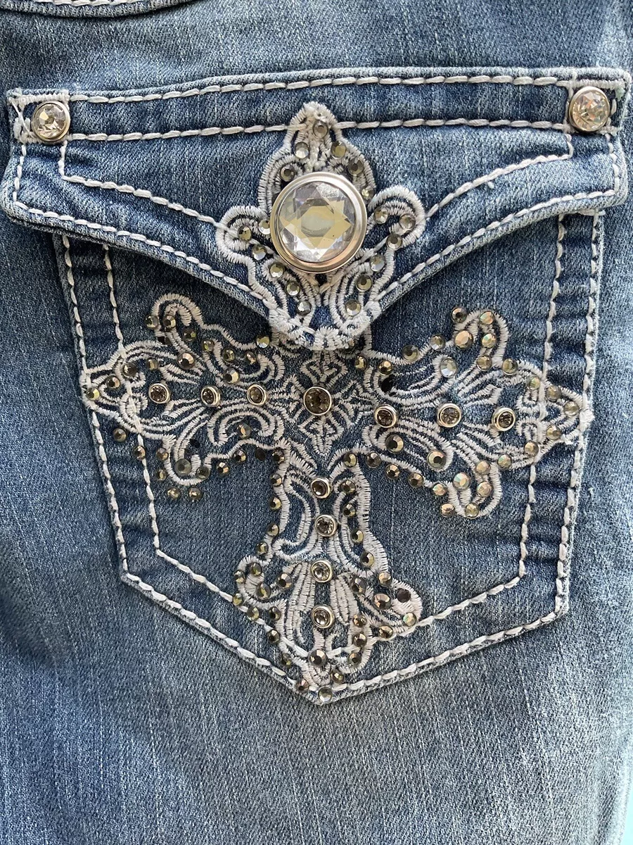 many cross pocket design denim jeans