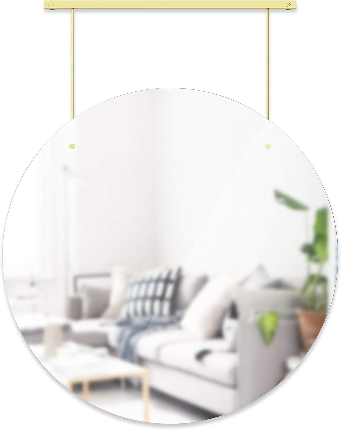 Miroir mural en laiton Umbra diamètre 61cm pour agrandir une pièce sombre sans grands travaux