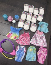 BABY ALIVE Lote Cucharadas Mágicas Cono de Helado Espolvorea Vestidos Mágicos para Biberón