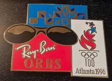 ATLANTA 1996 - RAY BAN ORBS BLOCK FONT OLYMPIC SPONSOR PIN