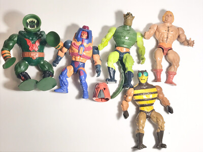 5 master of the universe action figures and extra helmet Whiplash He-man Bee