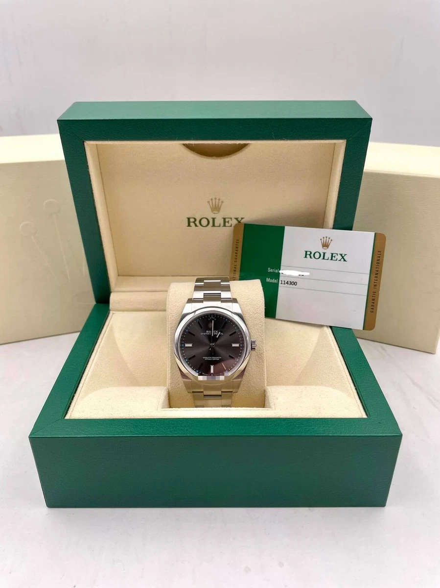 Rolex Oyster Perpetual 39mm Rhodium Dial 114300 Pre Owned 2016