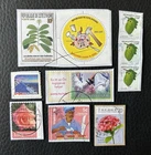 Lot of 10 stamps from various countries and various years - still on frag Stamps D46