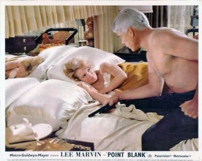 Point Blank Angie Dickinson lies in bed looks up at Lee Marvin 8x10 photo