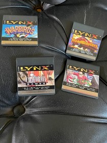 Atari Lynx Console With Case, AC adaptor, complete box, instructions, 4 games