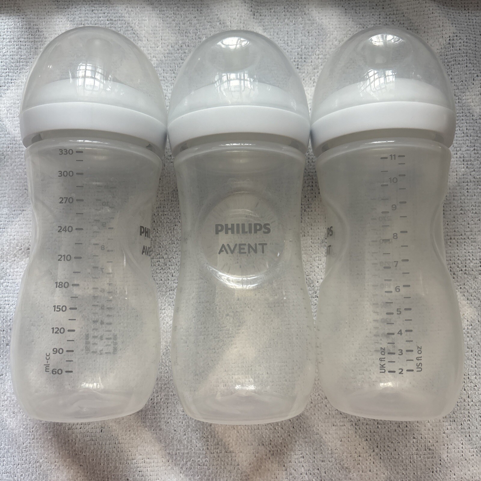 3 Phillips Avent Bottle And Nipples Plus Bottle Lids