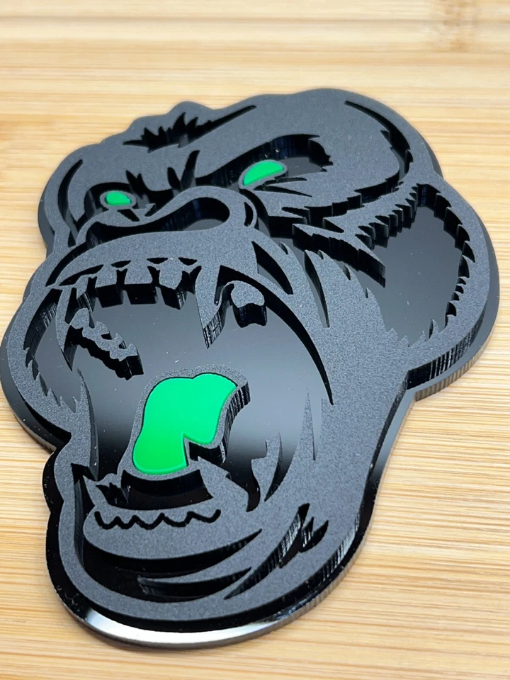 Insignia emblema coche camión ojo verde gorila enojado negro mate/negro paquete personalizado de 2 Foto 3 de 4