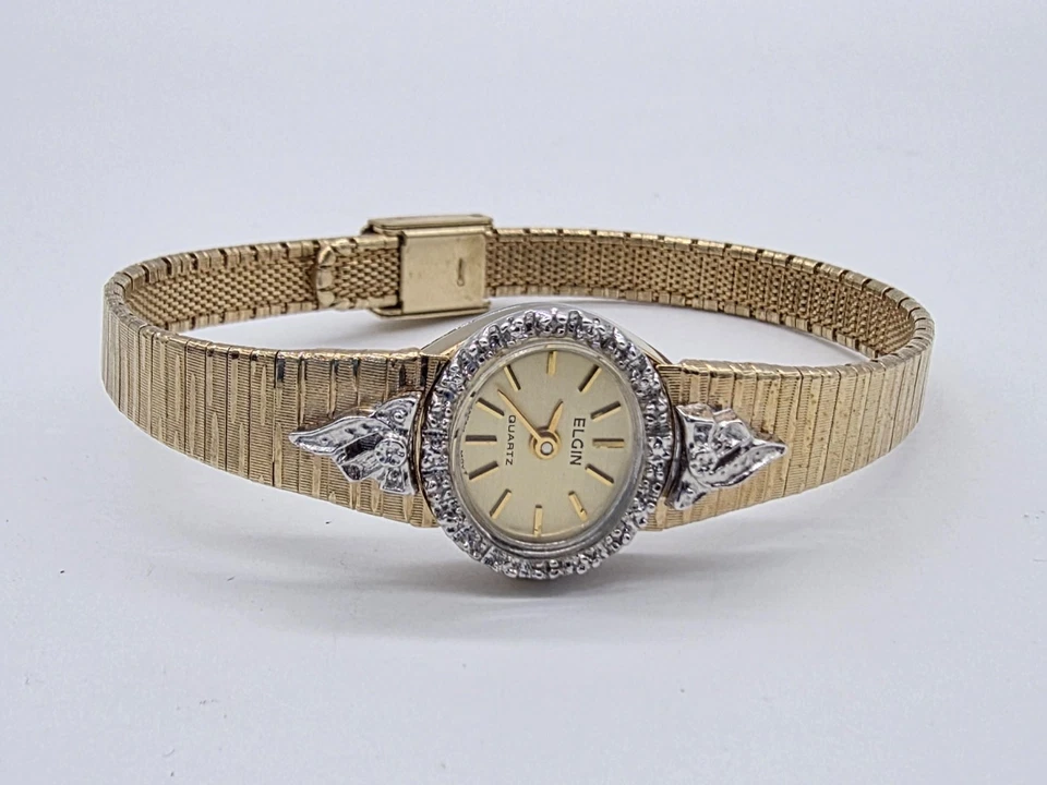 Reloj de cuarzo Elgin Lady tono dorado esfera amarilla claudette con caja detalles de diamantes Foto 4 de 4