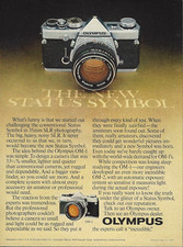 1977 Olympus OM-1 Status Symbol Camera vintage Print AD Advertisement