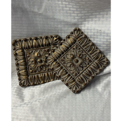 Set of unbranded decorative square plaque featuring an antiqued gold finish.