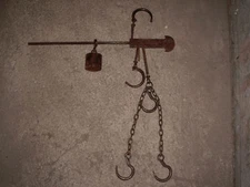  OLD SCALES WITH HOOKS AND WEIGHT USED FOR MEASURING COMMODITY.      