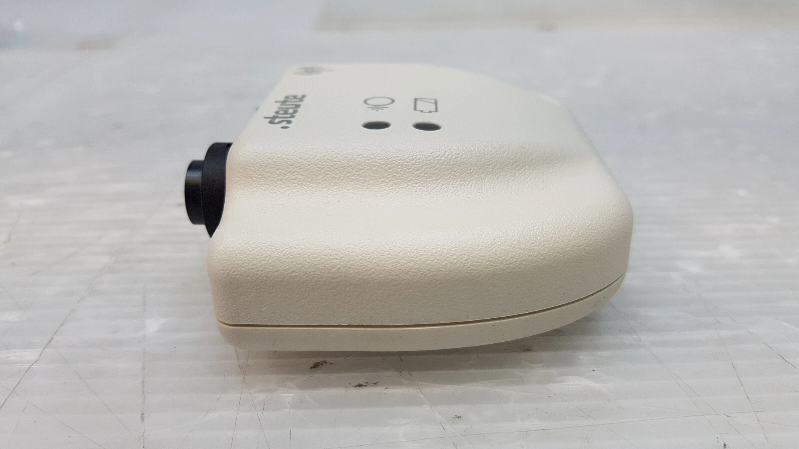 Side view of the beige steute wireless receiver housing