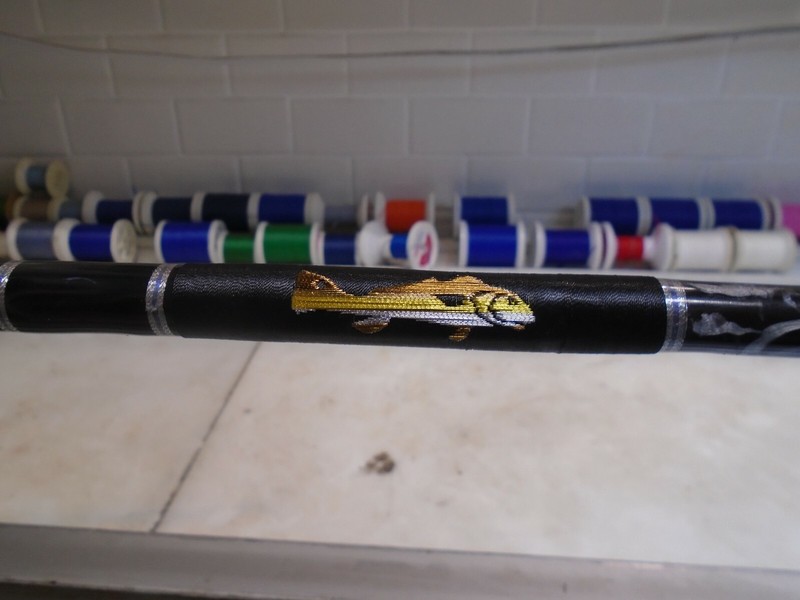 New, custom 7'2", 8 - 15 lb. spinning rod w/ hand-woven redfish