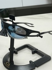 Oakley PLANTARIS Sunglasses OO9437-0363 Black/Gray Colorway Gradient Blue Lenses