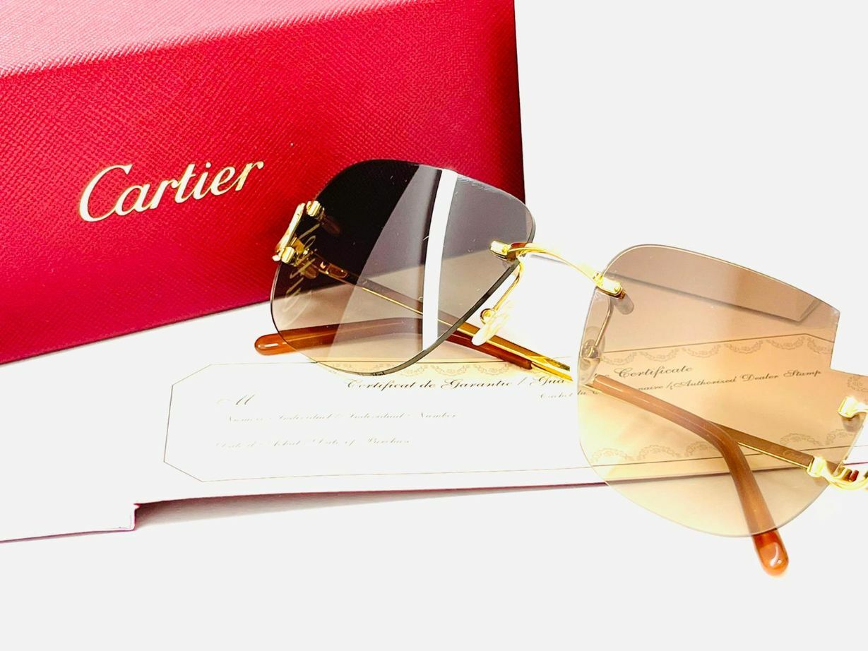 Cartier Rimless sunglasses Cartier Big C Rimless Piccadilly gold CT0092O - gafas ...