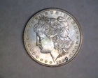 1896 MORGAN  DOLLLAR   UNCIRCULATED   BELOW SILVER VALUE WITH PUNCH BY DATE