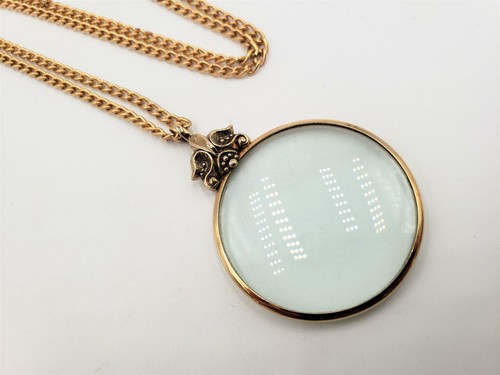 vintage avon magnifying glass necklace