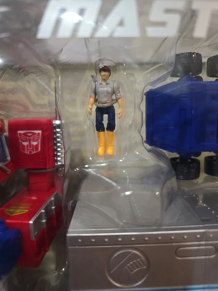 MP-10 Transformers Obra Maestra 🦒Optimus Prime Toys R Us Exclusivo Spike Autobot Foto 3 de 4