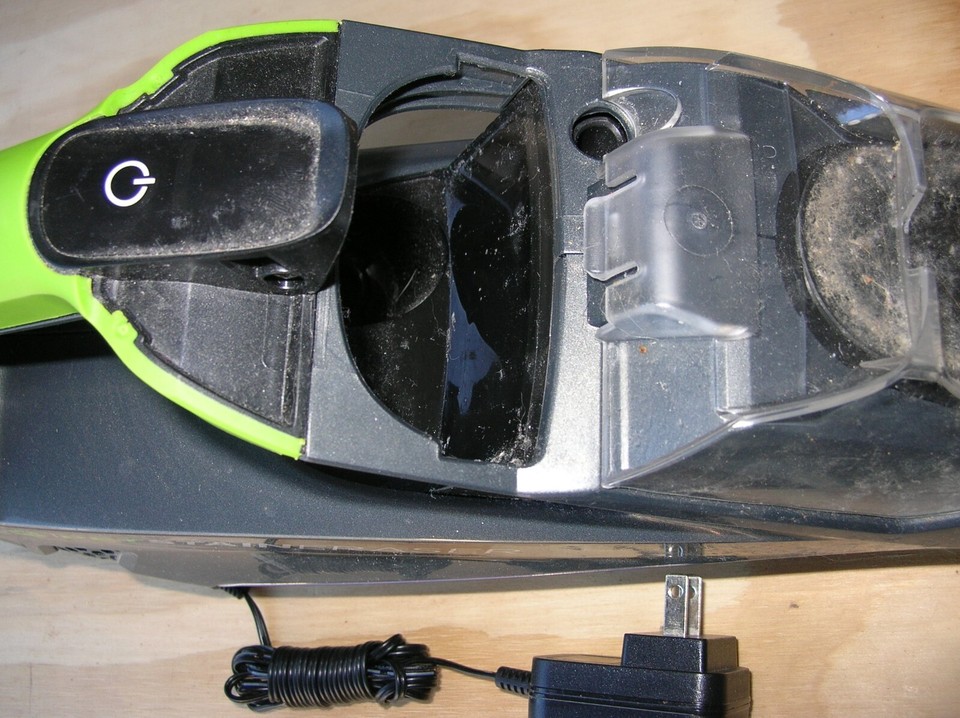 BISSELL 2003A Pet Stain Eraser Cordless Carpet Cleaner Green charger