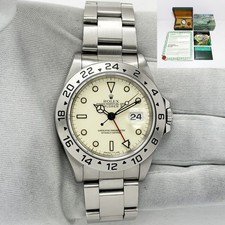 Rolex Explorer II Polar 16570 1996 40 mm pátina crema caja de acero papel serie T