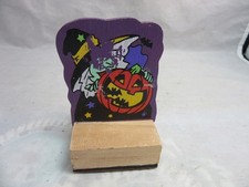 Halloween rubber stamp with witch and jack o' Lantern pumpkin