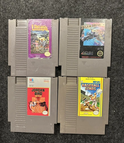 4 NES Game Lot: Ultima, Tiger-Heli, Baseball Stars, Jordan vs Bird