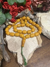 40. Yellow Butterscotch Bakelite Barrel Beads Green cord Beaded Prayer 20",65.7g