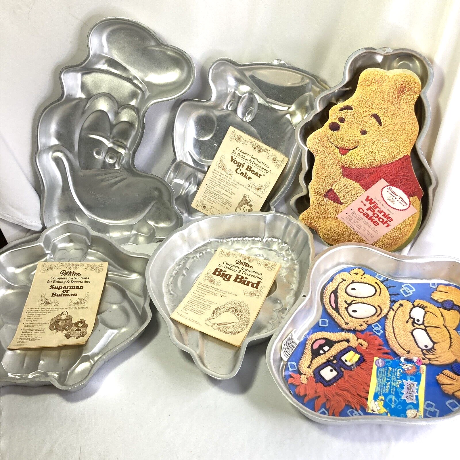 Vintage Lot of 6 Wilton Cake Pans Molds Goofy Yogi Superman Big Bird Pooh Rugrat