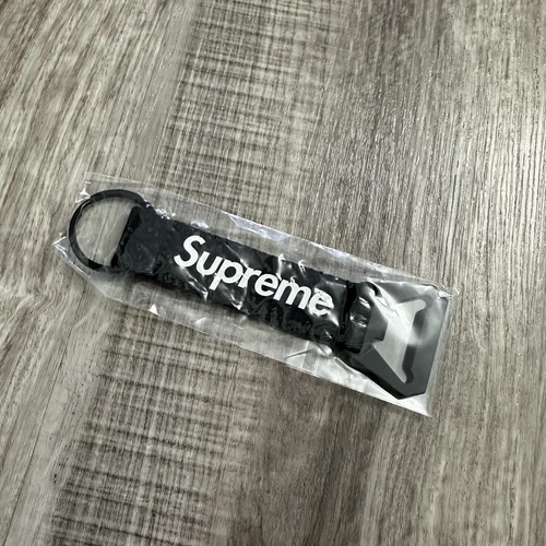 Porte clés sangle ouvre bouteille Supreme noir FW21 Neuf