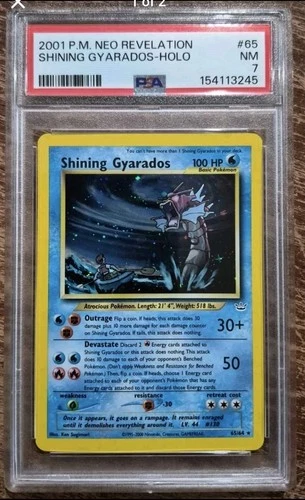 2001 POKEMON NEO REVELATION #65 SHINING GYARADOS-HOLO PSA 7