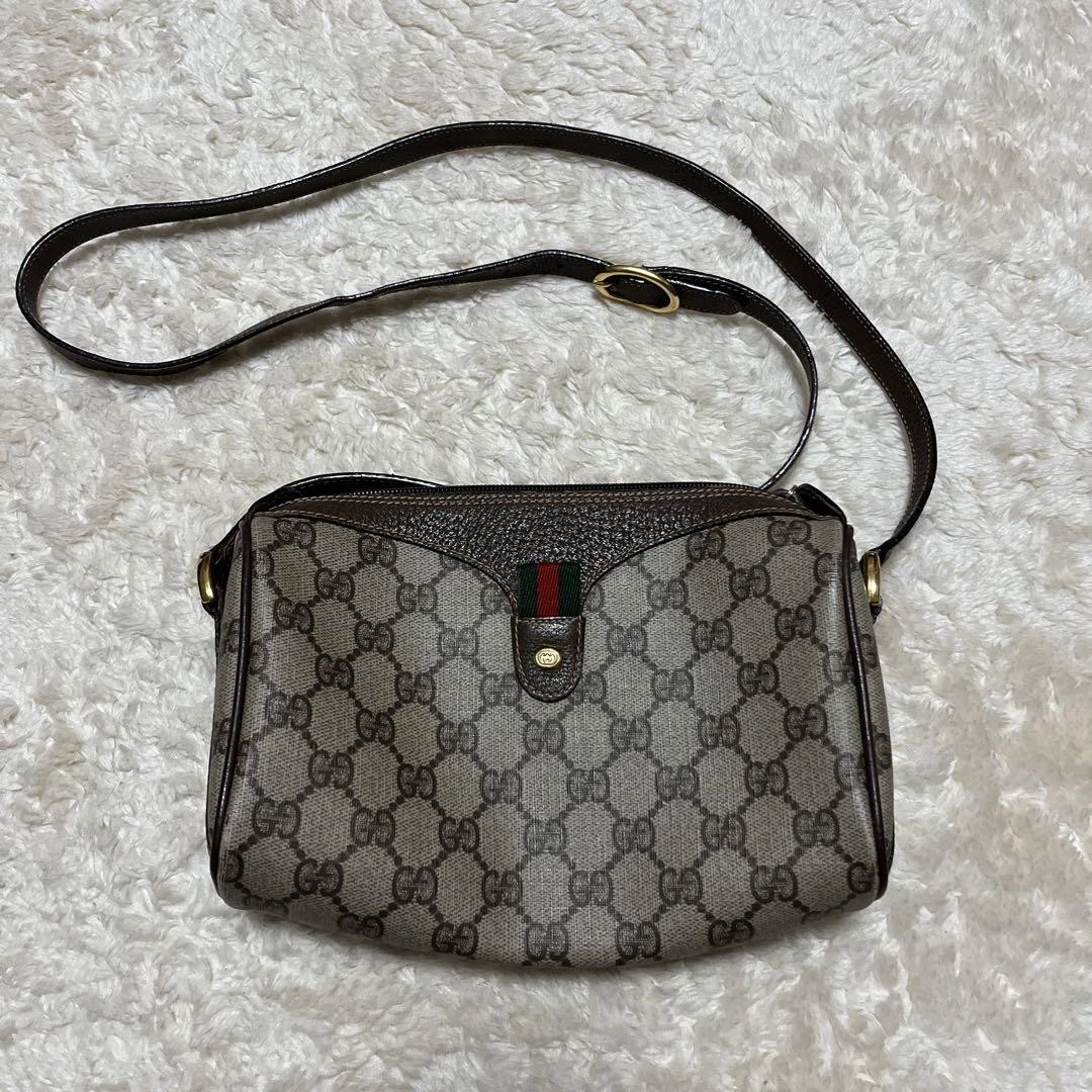Ancien sac à bandoulière GUCCI motif Gg