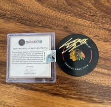 connord bedard signed puck gold ink