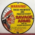 VINTAGE 1967 DATED SAVAGE ARMS THE 2ND AMENDMENT 10” PORCELAIN GAS OIL SIGN