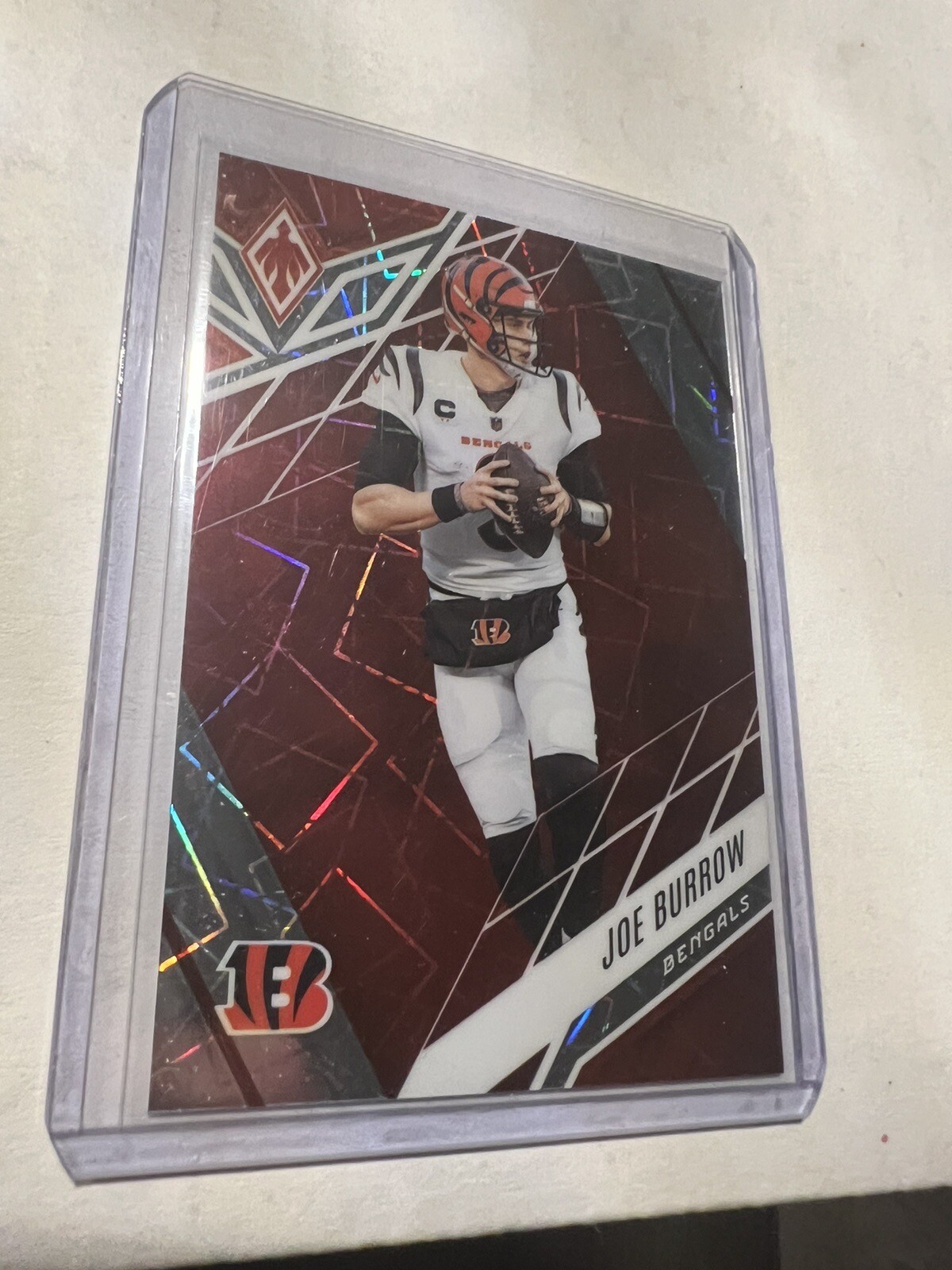 Joe Burrow 2022 Panini Phoenix #18 Red Laser Prizm /125 SP Bengals