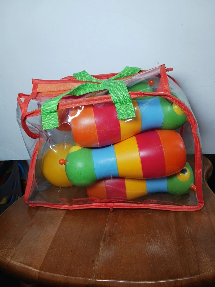 Juego de bolos Melissa & Doug Happy Giddy con estuche de transporte Foto 2 de 2