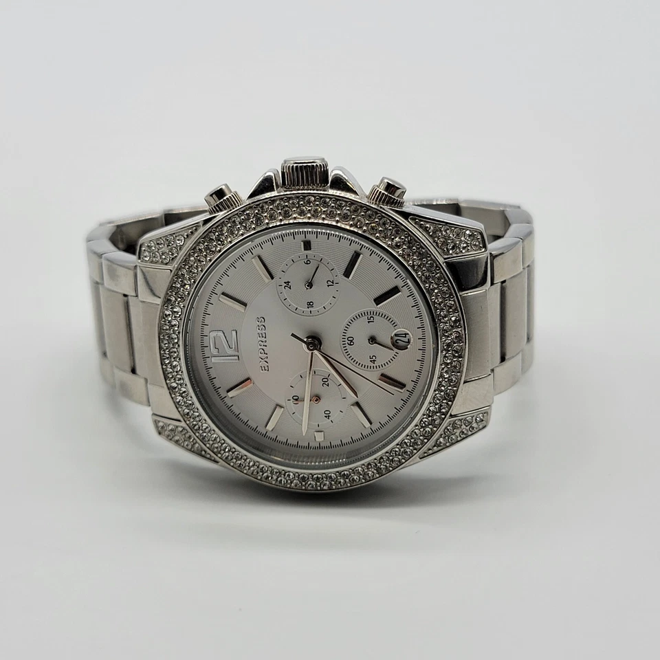 Reloj Express Mujer 39mm Esfera Blanca Fecha Estrás Tono Plateado Banda 6.8", Funciona Foto 3 de 4