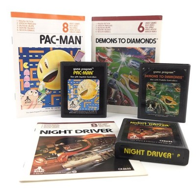 Atari 2600 Spiele Bundle: Pac-Man , Demons of Diamonds , Night Driver & Manuals