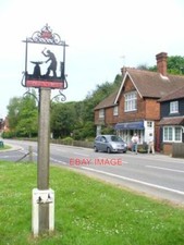 PHOTO  ABINGER HAMMER VILLAGE SIGN SHOWING A BLACKSMITH AT WORK IN THIS VILLAGE