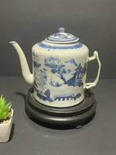 Blue and white porcelain landscape teapot $285