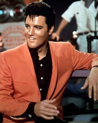 Elvis Presley classic in black shirt & orange jacket 1968 Speedway