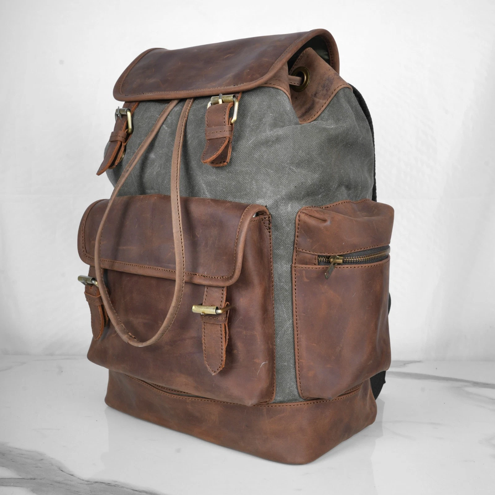 Olive green waxed canvas & leather backpack, rucksack, travel shoulder bag.